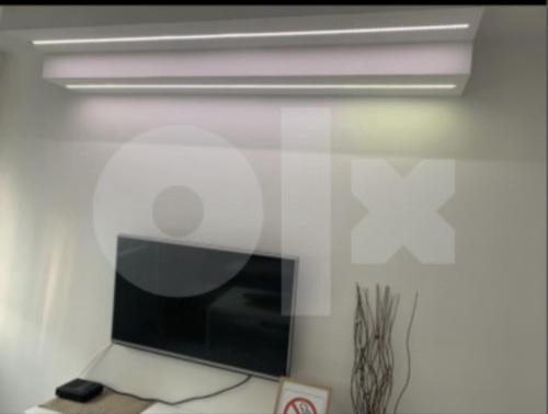 TV a/nebo společenská místnost v ubytování Apartman 078