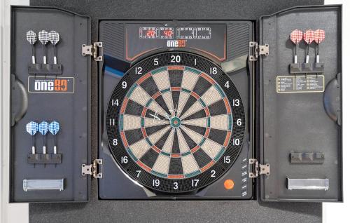a dart board in a black box with darts at Stunning Home In Jægerspris With Sauna in Jægerspris