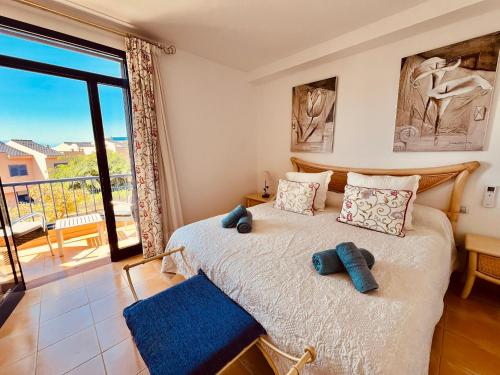 En eller flere senge i et værelse på Oasis Meloneras cerca del mar