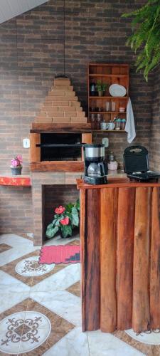 Dapur atau dapur kecil di Pousada Rancho das Flores