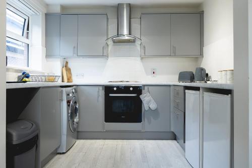 Η κουζίνα ή μικρή κουζίνα στο Sunderland City Centre Cosy 2 Bed Apartment