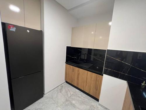 Cozy apartment in la soukraにあるキッチンまたは簡易キッチン