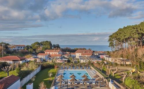 an aerial view of a resort with a swimming pool at Résidence Domaine Iratzia Erromardie - Appartement T2 in Saint-Jean-de-Luz