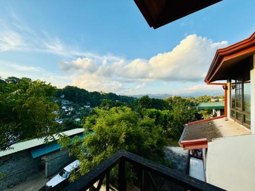 a view from the balcony of a house at The Tenthola in Kandy