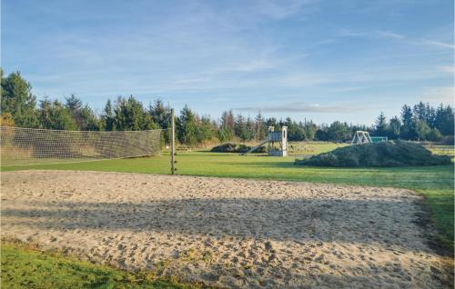 a soccer field with a goal in the grass at 4 Bedroom Cozy Home In Brovst in Brovst