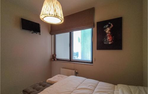 Katil atau katil-katil dalam bilik di Cozy Apartment In Oostende With Wifi