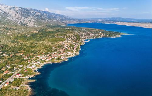an aerial view of a town next to a body of water at Lovely Home In Seline With Sauna in Seline