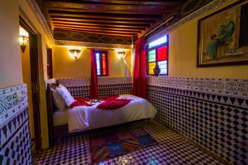 Cama o camas de una habitación en Riad Ibn Khaldoun
