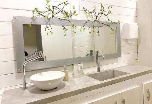 Un baño de Casa Madre Hostel Feminino