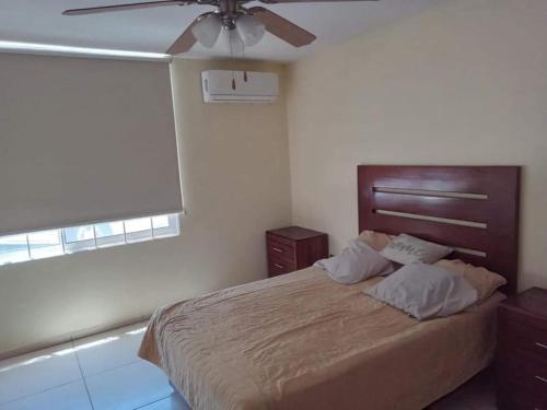 Katil atau katil-katil dalam bilik di Apartamento En Anahuac