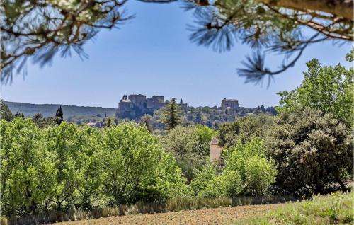 a view of a hill with a castle in the background at Le Panorama in Roussas