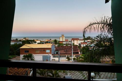 a view of a city from a balcony at Pousada Timoneiro in Vila Velha