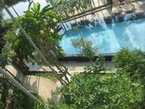 La alberca dentro o cerca de Palm View Villa