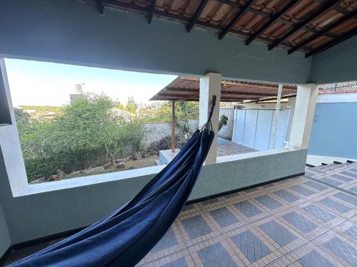 Balkoni atau teres di Casa completa próximo à praia | MAAL01