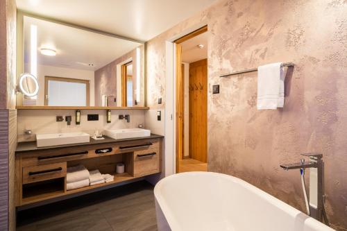 Vannituba majutusasutuses Resort La Ginabelle