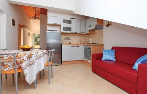 Kuchyň nebo kuchyňský kout v ubytování Apartment Prigradica O-525