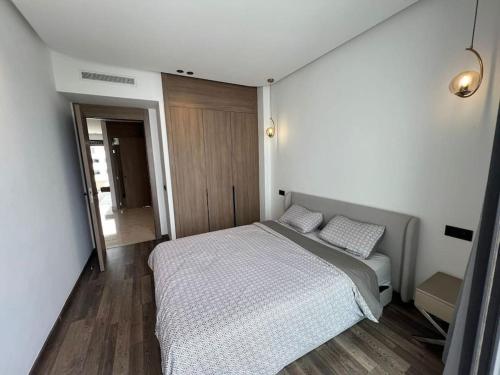 Letto o letti in una camera di Appartement vaste et lumineux, Oasis