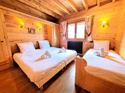 Postel nebo postele na pokoji v ubytování Résidence Epilobe - Appartement 4 pièces au coeur du village MAE-0861