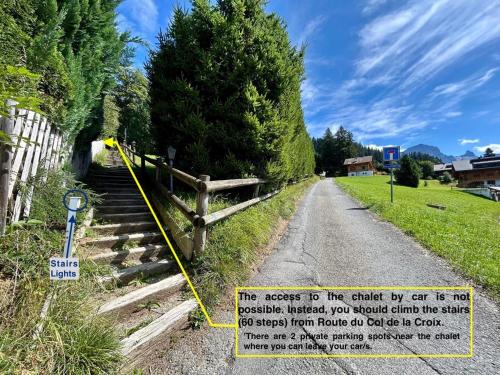 a warning sign on a dirt road with a fence at Peace & comfort - Great views and location in Villars-sur-Ollon
