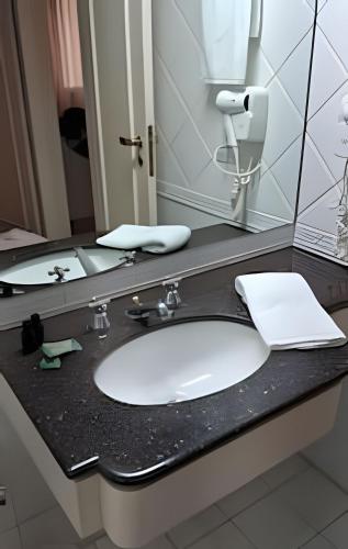 Bilik mandi di Flat Hotel Executivo Vila Olímpia (Apto 2509)