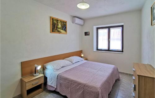 Katil atau katil-katil dalam bilik di Cozy Home In Brsec With Wifi