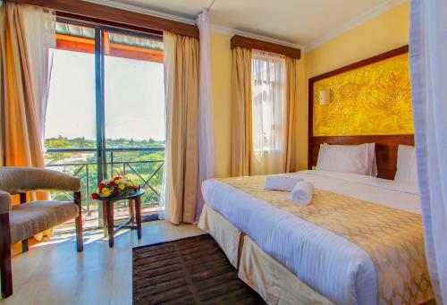 Ένα ή περισσότερα κρεβάτια σε δωμάτιο στο Vittoria Suites