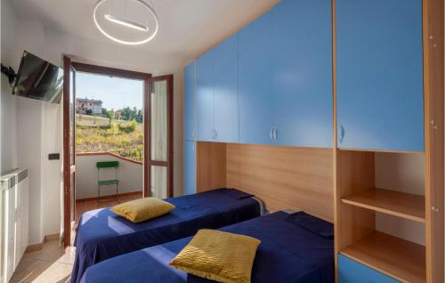 Ένα ή περισσότερα κρεβάτια σε δωμάτιο στο Lovely Apartment In San Costanzo