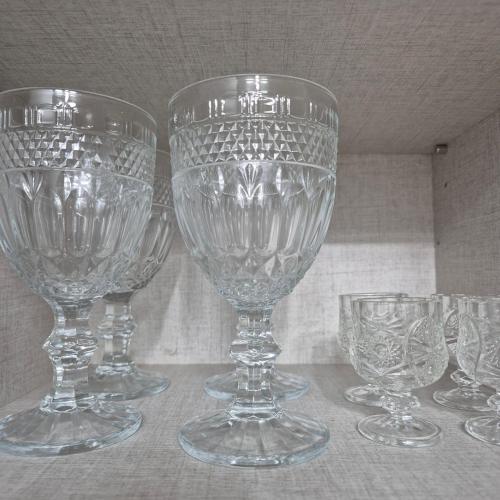a group of wine glasses sitting on a table at Warm Place in Seoul