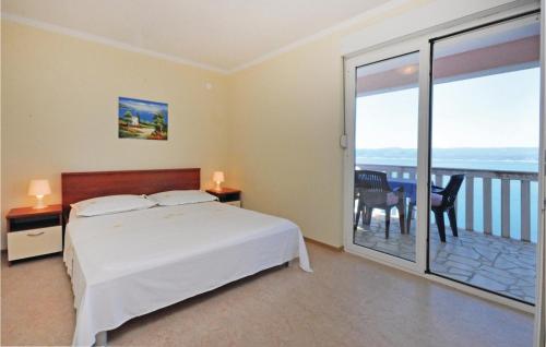 Posteľ alebo postele v izbe v ubytovaní Apartment Mimice With Sea View 382