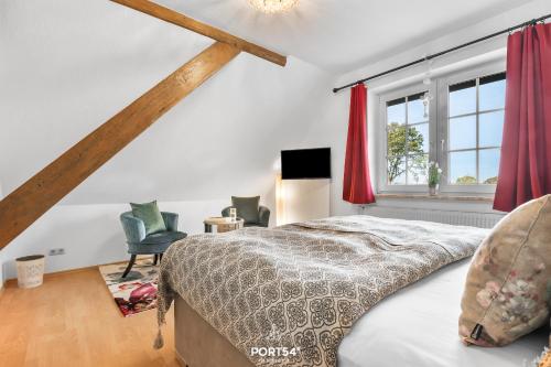 Postel nebo postele na pokoji v ubytování Ferienwohnung Zur Westerweide Delve