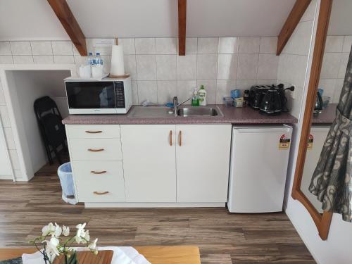 Cuisine ou kitchenette dans l'établissement Luxurious studio room