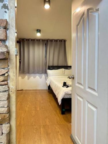 Postel nebo postele na pokoji v ubytování Chubbi 5 Room10