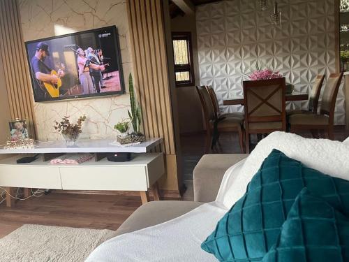 Μια τηλεόραση ή/και κέντρο ψυχαγωγίας στο Casa aconchegante