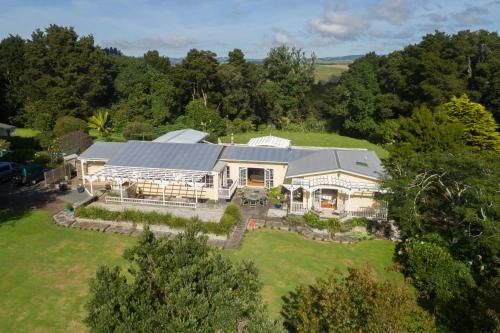 an aerial view of a large white house at Keriwin House in Kerikeri