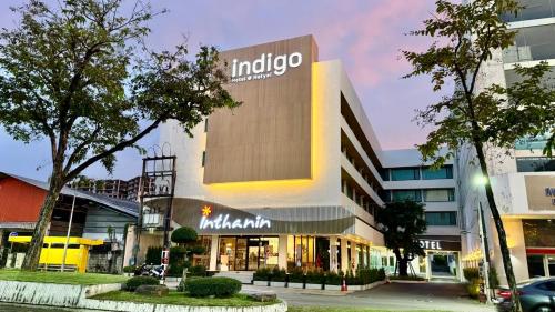 a building with an indico sign on the side of it at indigo Hotel Hatyai in Ban Kohong