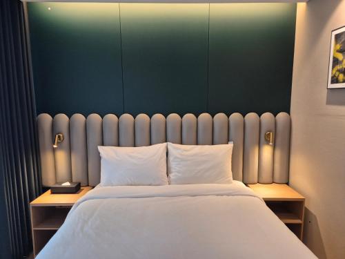 Katil atau katil-katil dalam bilik di The solid residence - Elbon the stay by haeundae