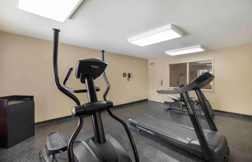 a gym with two exercise bikes in a room at Extended Stay America Suites - Dallas - Plano in Plano