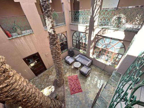 an overhead view of a building with a palm tree at Dar Nakhla - Zagora guest house in Zagora