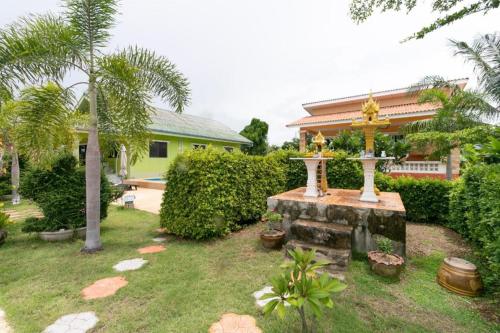 Zahrada ubytování OYO 949 Sansuk Resort Paknampran