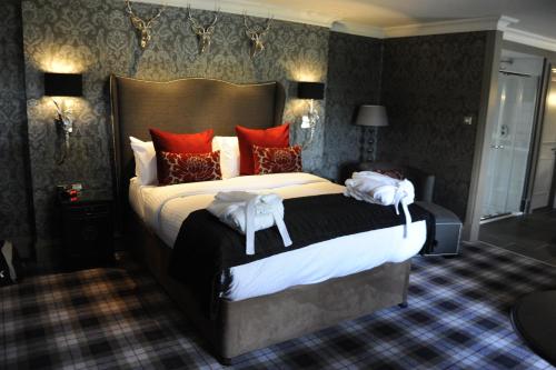 Postel nebo postele na pokoji v ubytování Best Western Glasgow South Eglinton Arms Hotel