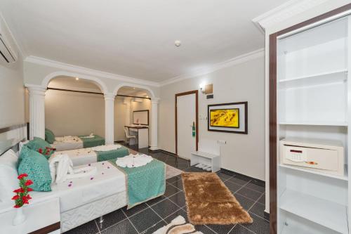 Ένα ή περισσότερα κρεβάτια σε δωμάτιο στο Otel Carpe Diem Gold