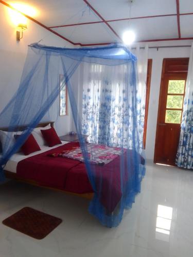 Ένα ή περισσότερα κρεβάτια σε δωμάτιο στο Nature's Glow Homestay And Resturant