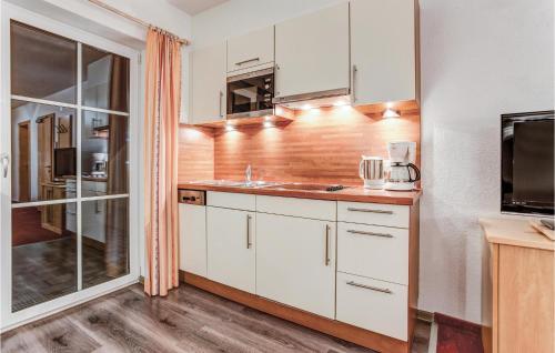 Kuchyňa alebo kuchynka v ubytovaní Moderne Ferienwohnung St,anton