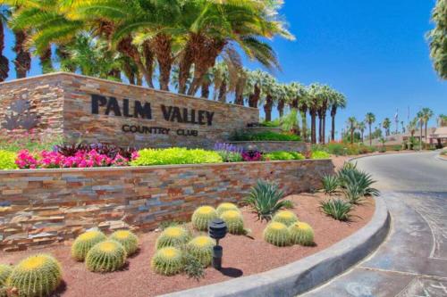 a sign for the palm valley conference center at The Country Club Experience in Palm Desert