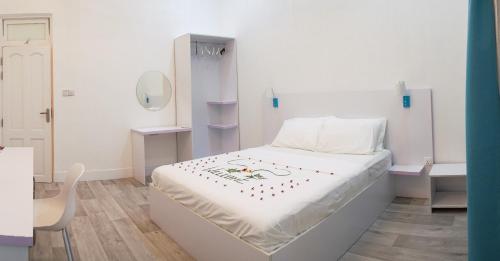 Postel nebo postele na pokoji v ubytování Casa De Himandhoo