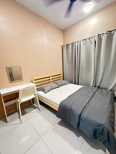 Postel nebo postele na pokoji v ubytování Apartment in Batu Kawan