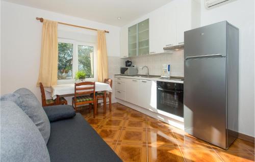 Kuchyň nebo kuchyňský kout v ubytování Apartment Mimice Mimice Brig Iv