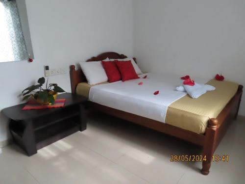 Cama o camas de una habitación en Ceylone Sun Garden