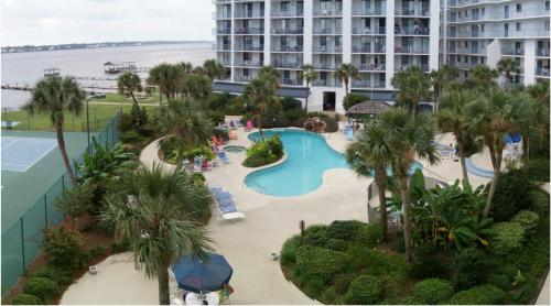 an aerial view of a pool at a resort at Gulf Shores Surf & Racquet Club 212A in Gulf Shores