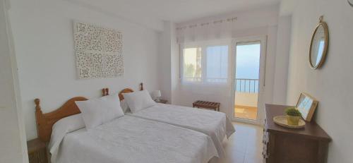 Apartamento con piscina en la primera línea de playa de Fuengirola
